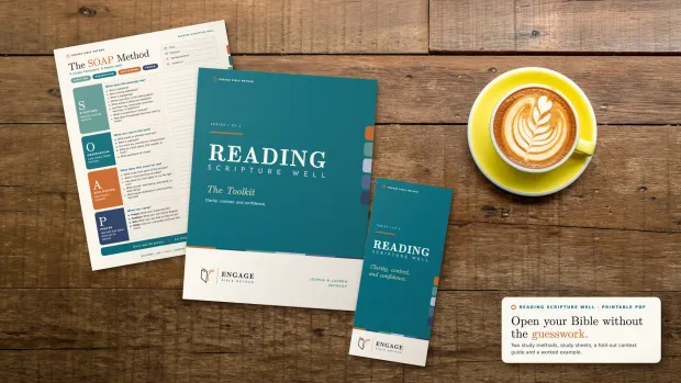 The Reading Scripture Well Toolkit: a SOAP study sheet, the toolkit cover and the fold-out trifold on a wooden table